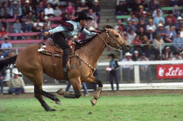 Image of Italy Spratt riding her horse at Pendleton Roundup Rodeo